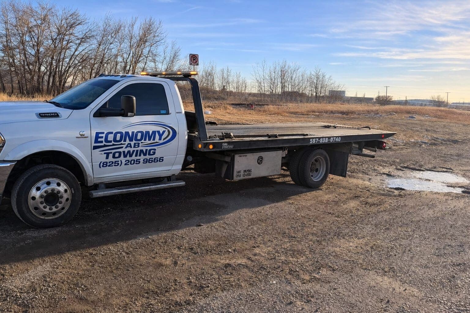 Tow truck providing roadside assistance